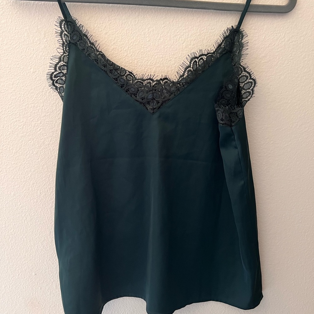 Cute forest green cami with dark lace detail.